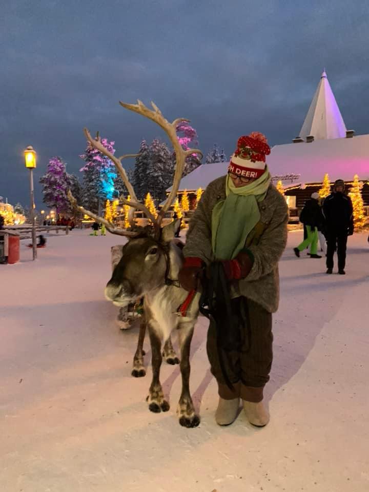 Johanna Kiviniemi at Santa Claus Village with the reindeer