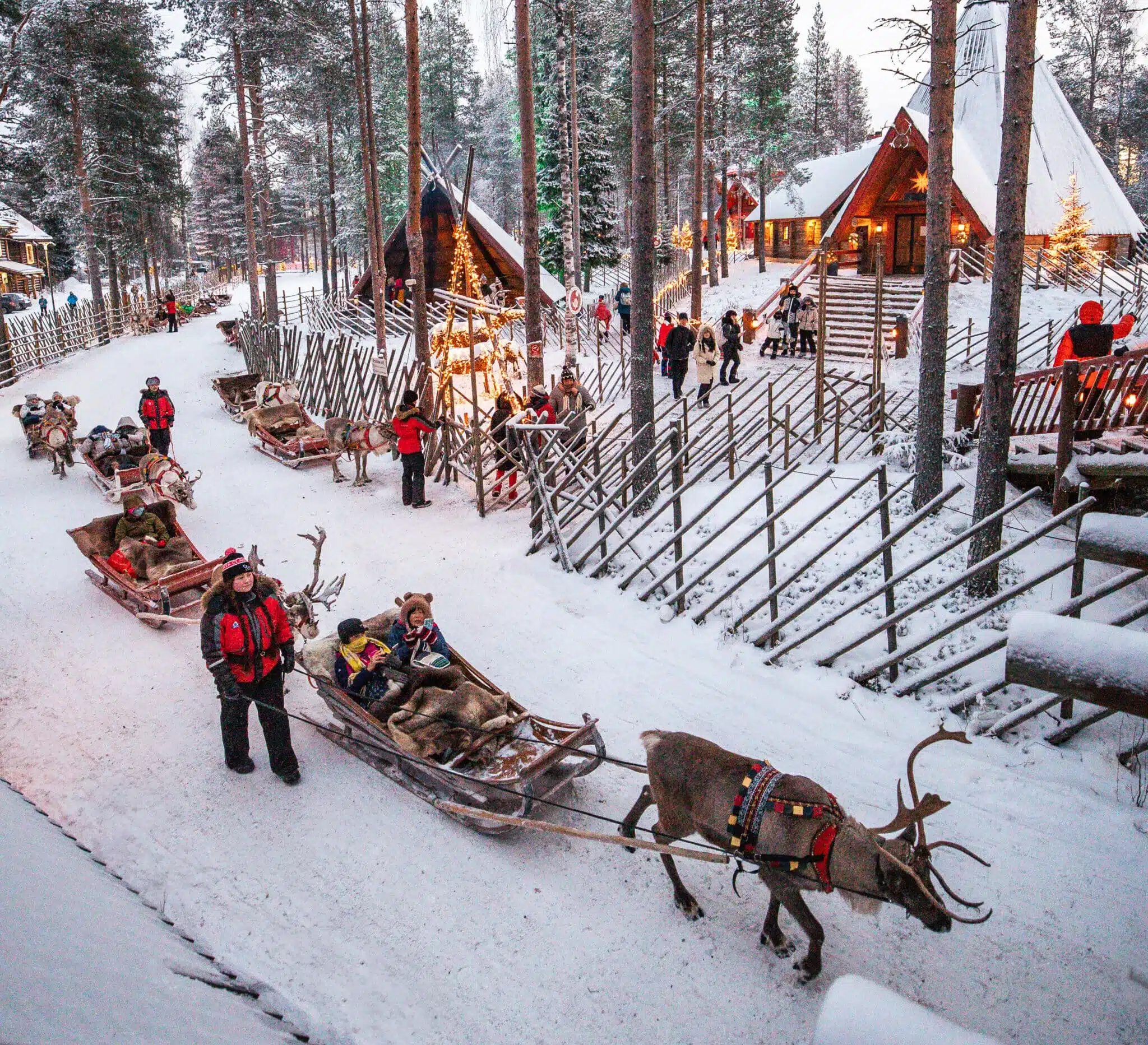 Reindeer sleighs departing at Santa Claus Village