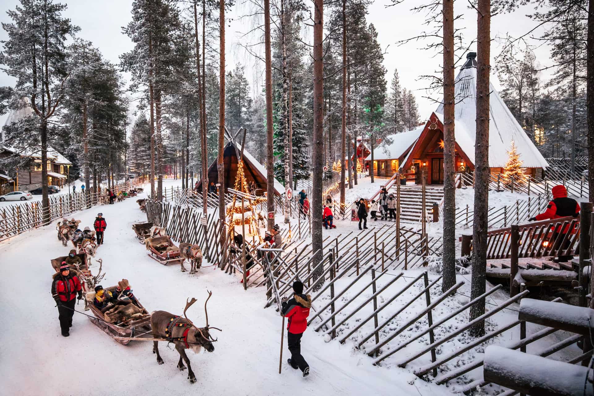 Reindeer sleighs departing at Santa Claus Village in Rovaniemi