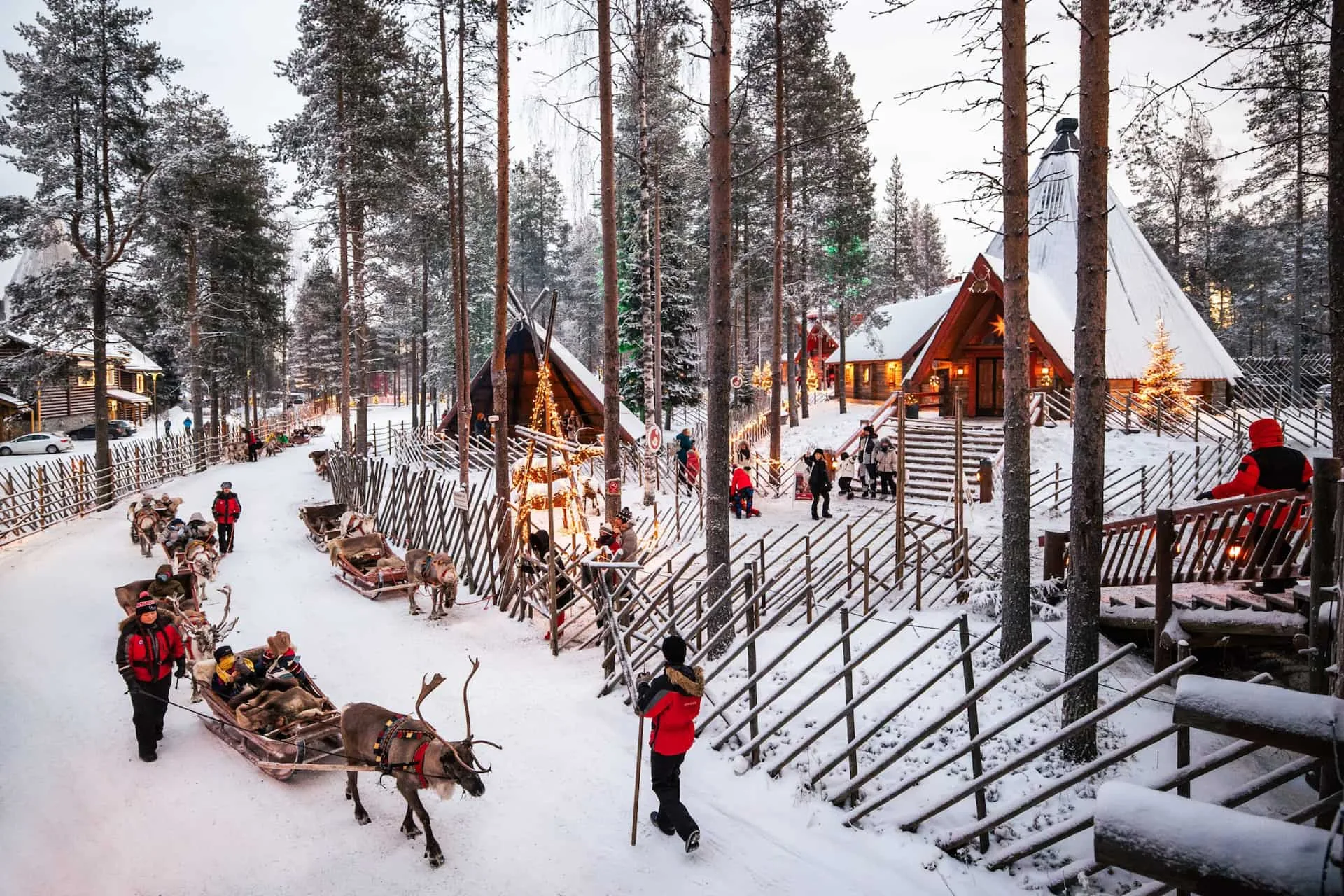 Reindeer sleighs departing at Santa Claus Village in Rovaniemi